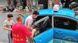 安達(dá)出租車愛(ài)心送考車為考生加油助力